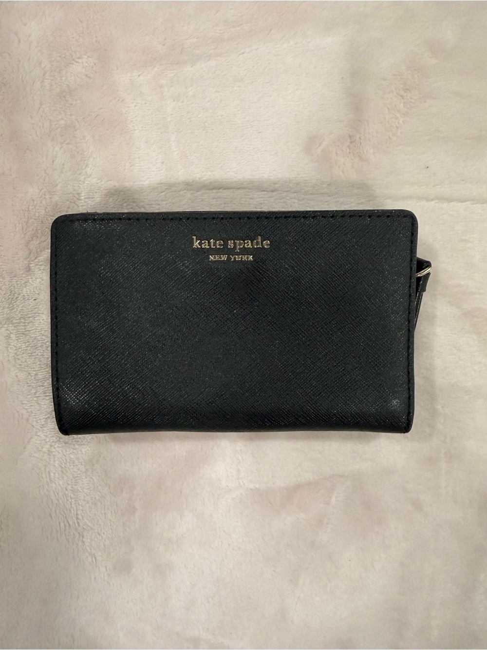kate spade black leather zip-around wallet with gold logo